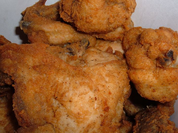 Original Recipe fried chicken pieces in a bucket
