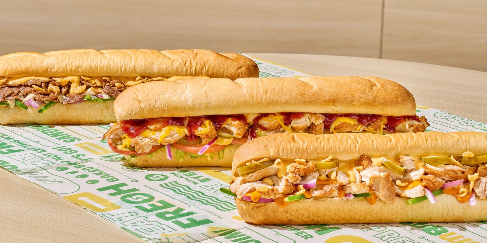 Several footlong submarine sandwiches with fillings